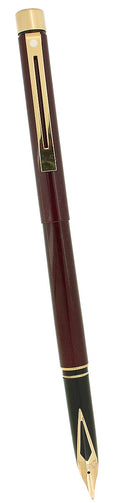 C1988 SHEAFFER TARGA SLIMLINE METALLIC GARNET MODEL 1052S 14K MEDIUM NIB FOUNTAIN PEN NEVER INKED OFFERED BY ANTIQUE DIGGER
