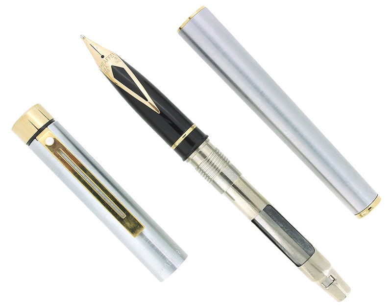 CIRCA 1976 SHEAFFER TARGA BRUSHED STAINLESS GOLD TRIM 14K BROAD NIB FOUNTAIN PEN NEVER INKED OFFERED BY ANTIQUE DIGGER