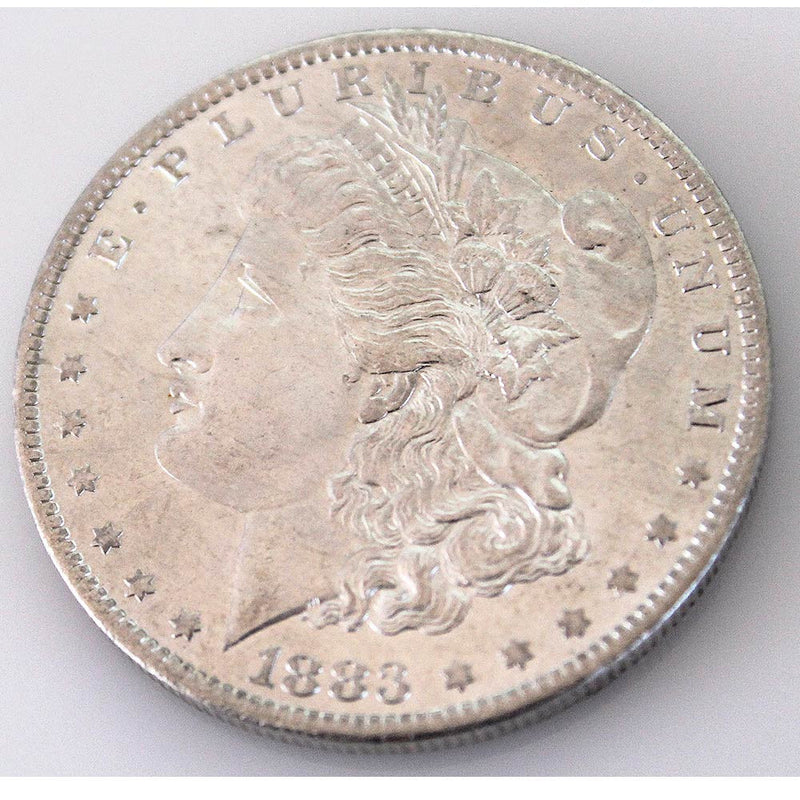 1883-O Morgan Silver Dollar (side) from AntiqueDigger.com
