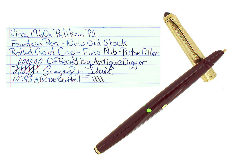 CIRCA 1958 PELIKAN P1 ROLLED GOLD CAP BURGUNDY BARREL FOUNTAIN PEN NOS STICKERED OFFERED BY ANTIQUE DIGGER