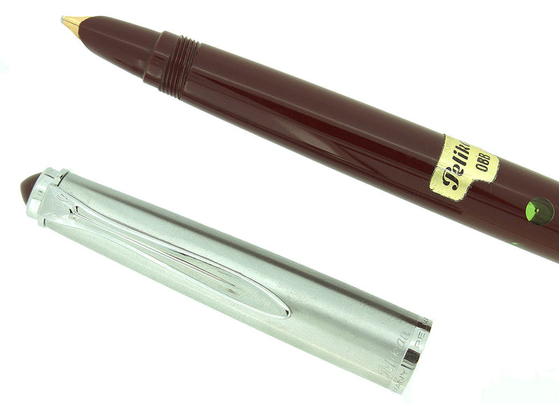 CIRCA 1958 PELIKAN P1 STAINLESS CAP BURGUNDY BARREL FOUNTAIN PEN NOS STICKERED OFFERED BY ANTIQUE DIGGER